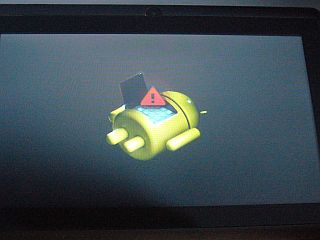 図1:妙な表示が出た!? <click>→図2:何かの設定画面