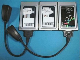 LANカード(左・中央:IOデータ製,右端:Accton製)と付属ケーブル